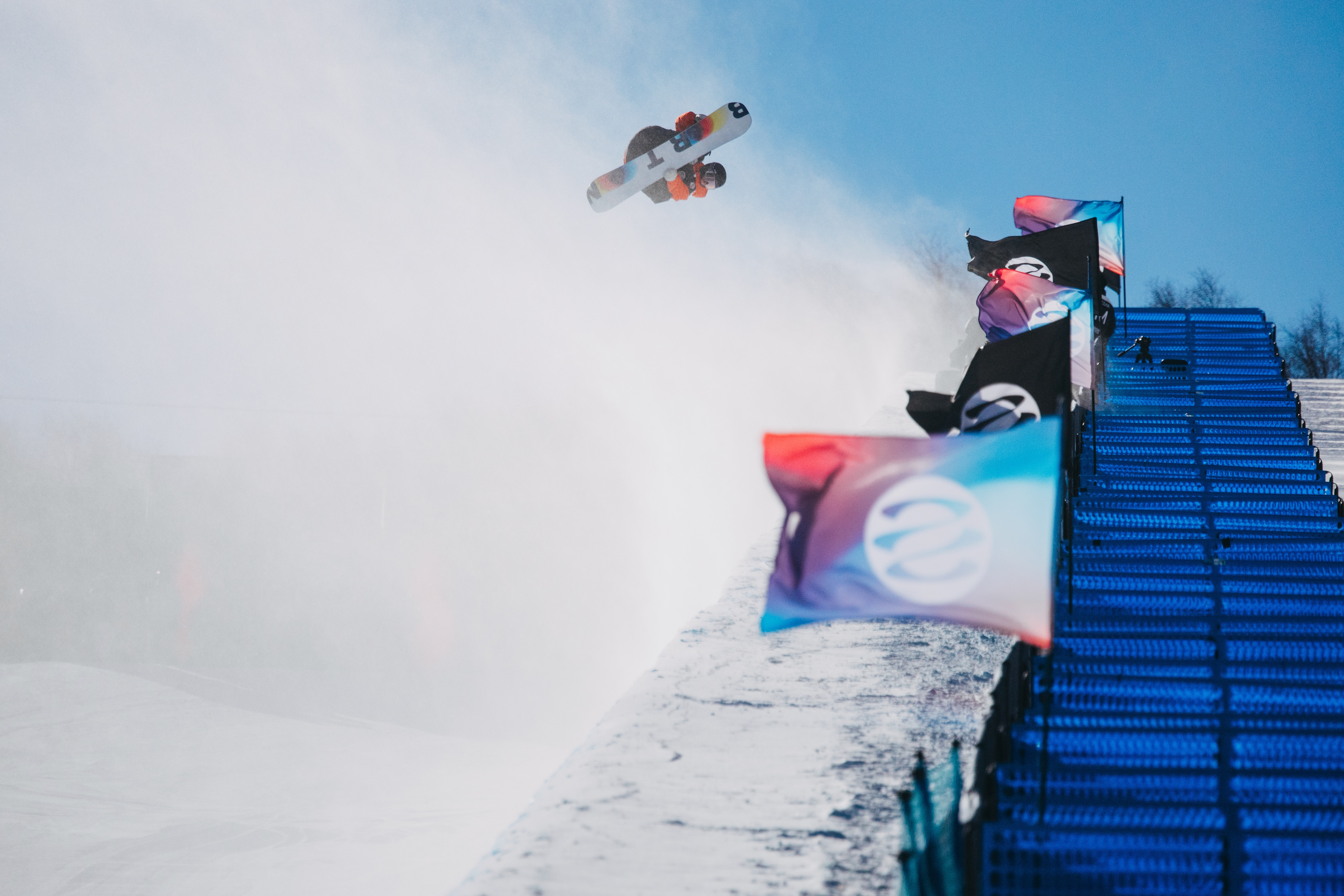 Jonas Hasler snowboarding in a freestyle action sequence